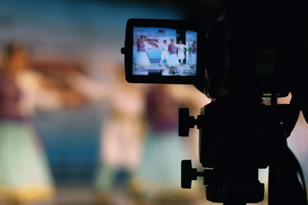 A view through a camera lens of Bollywood style dancers