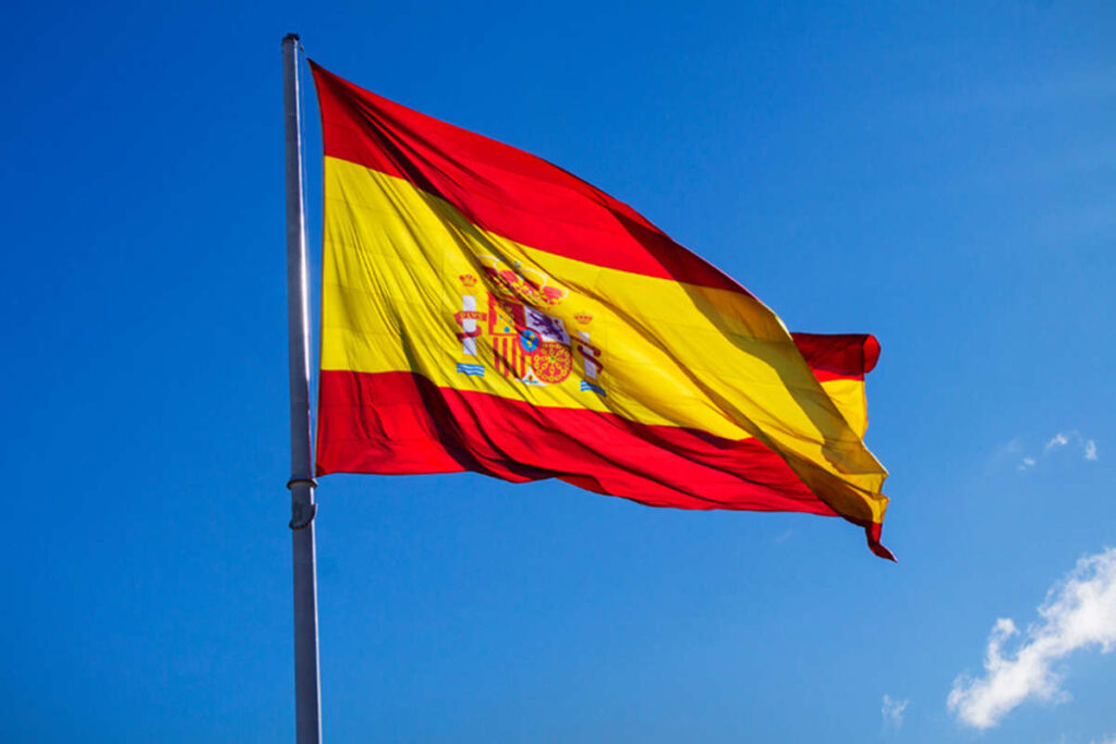 The Spanish flag flying proudly in the wind