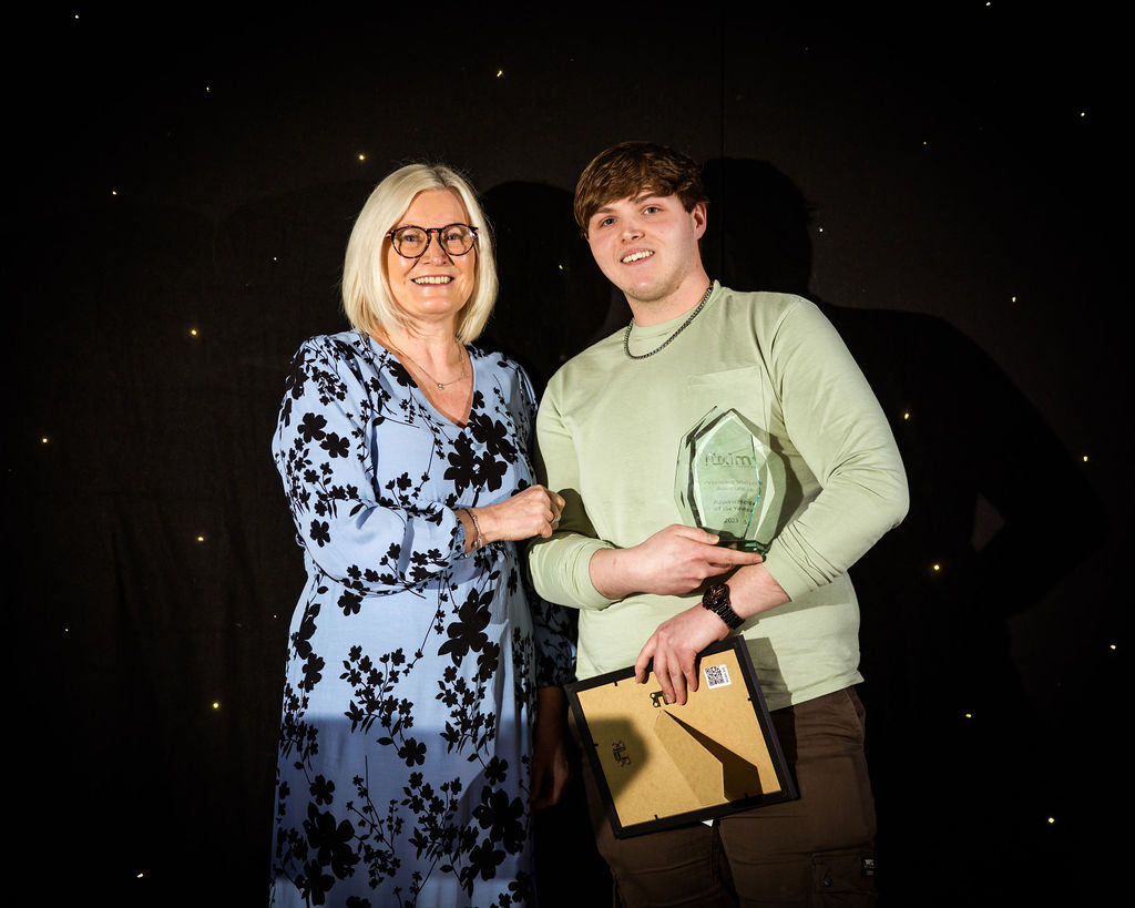 An apprentice being given his award at the apprenticeship awards 2023