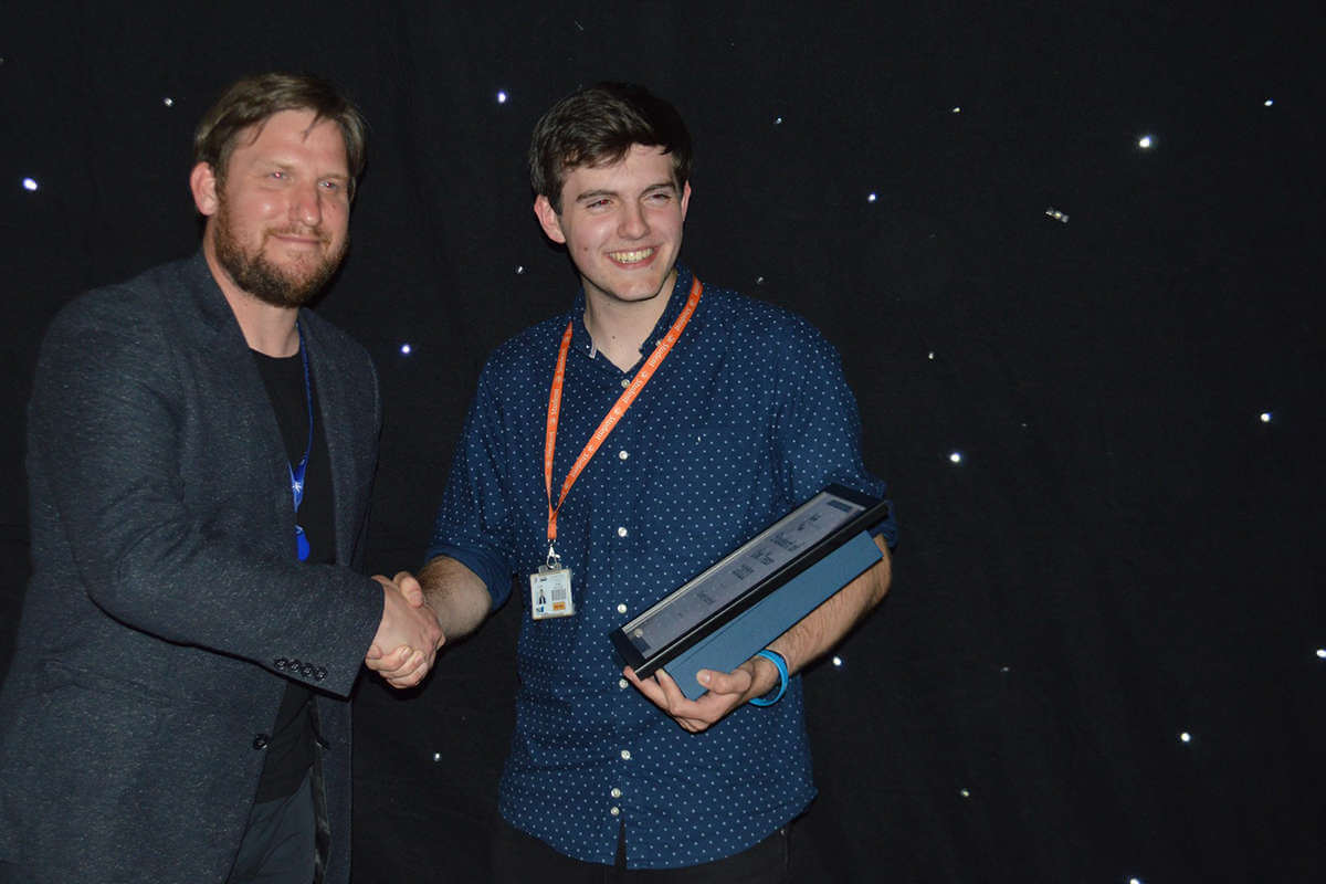 Student of the year receiving his award