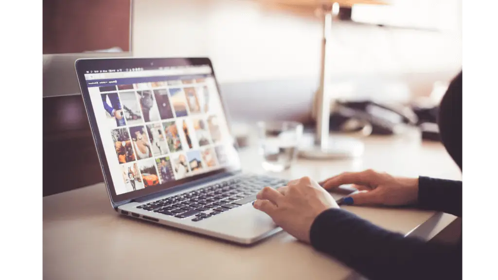 A marketing apprentice on a laptop