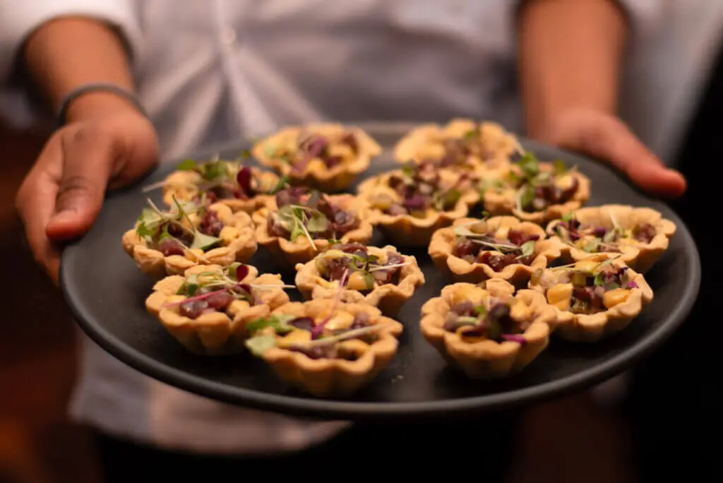 A plate filled with canapes made by whites chef academy students from Macclesfield College