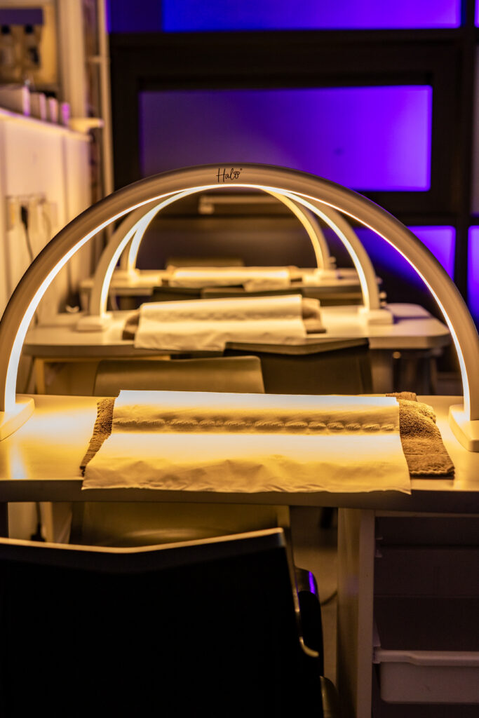 A beauty nail lamp set up in Macclesfield College's Pure Salon