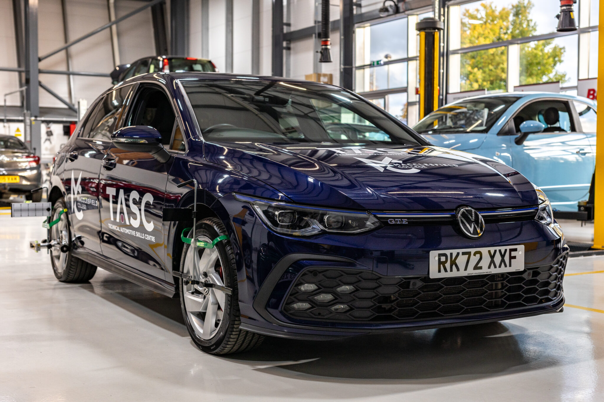 A photograph of blue TASC car