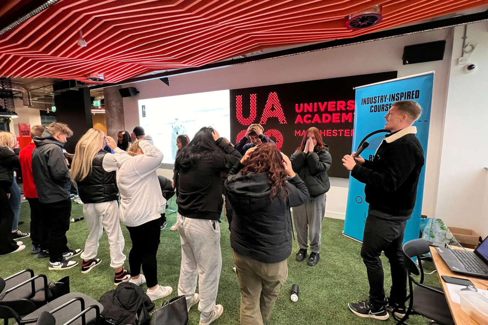 A group of students are on a trip to UA92 and doing team building exercises