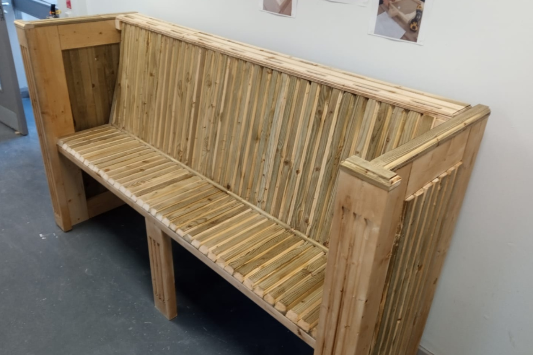 A wooden bench made by Carpentry & Joinery apprentices.