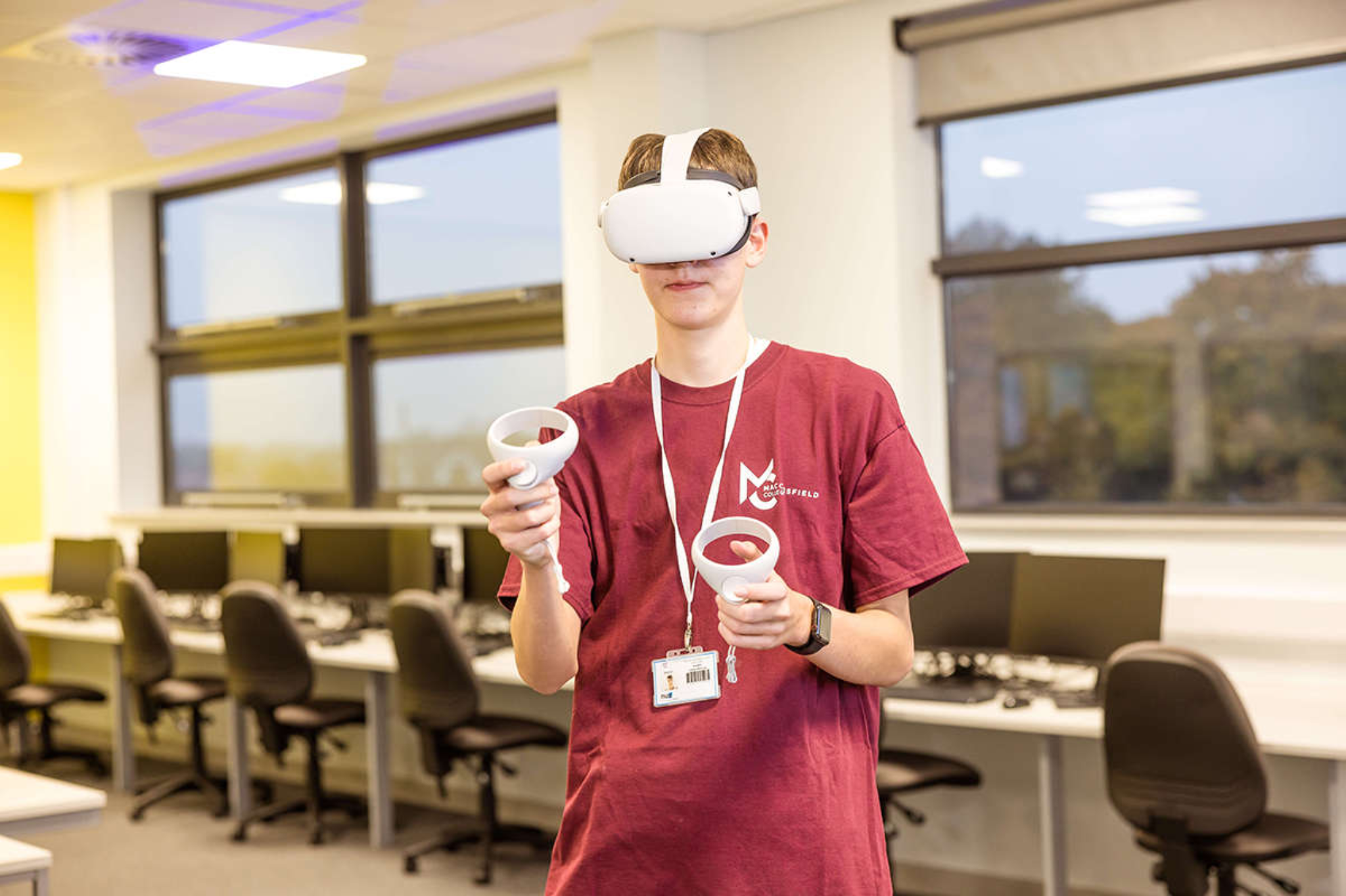 A computing student wearing a VR headset