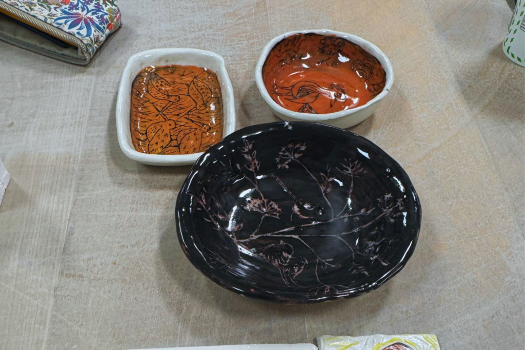 Three ceramic bowls made my pottery students from Macclesfield College