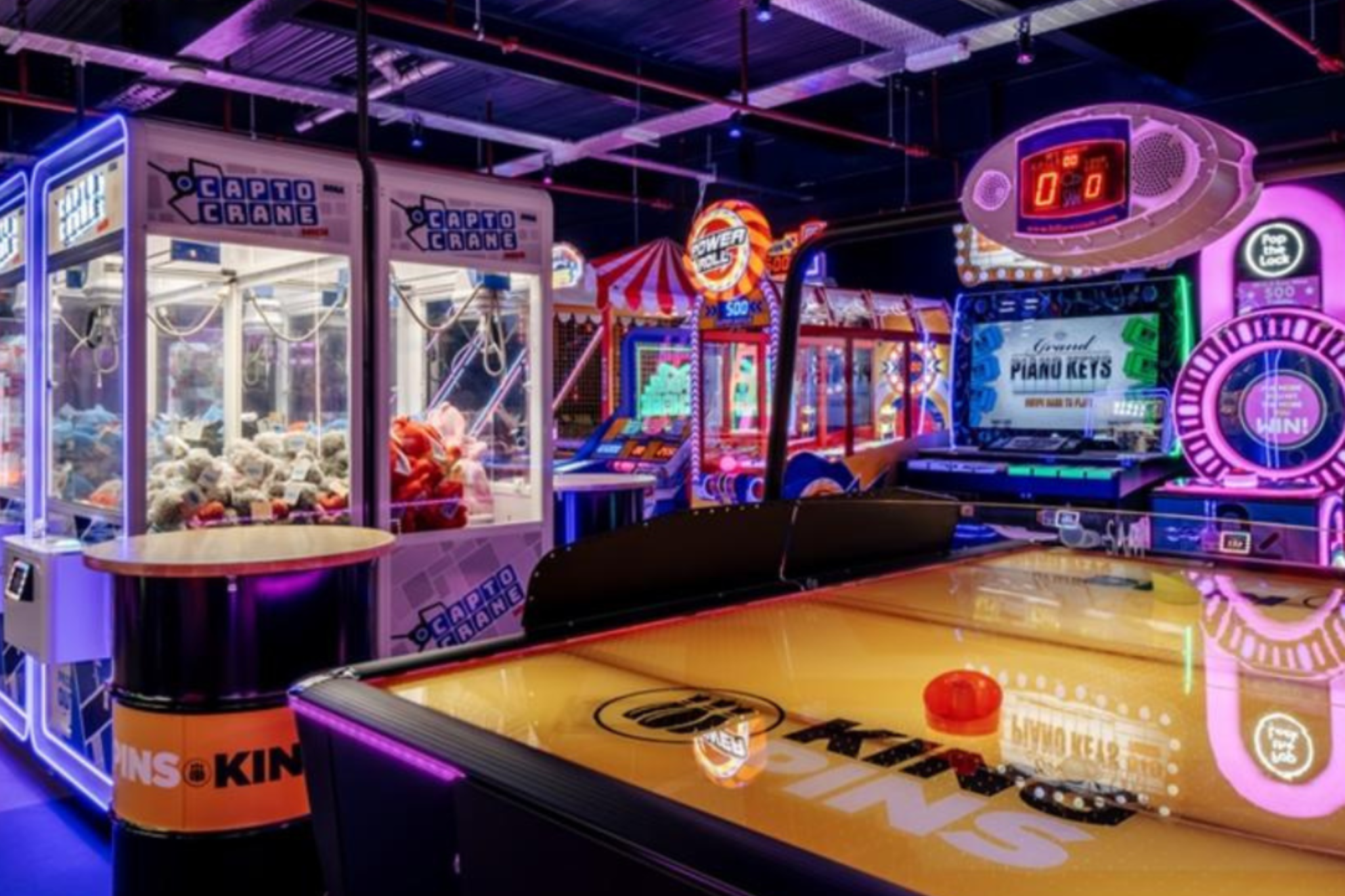 A photograph of arcade games at King Pins.