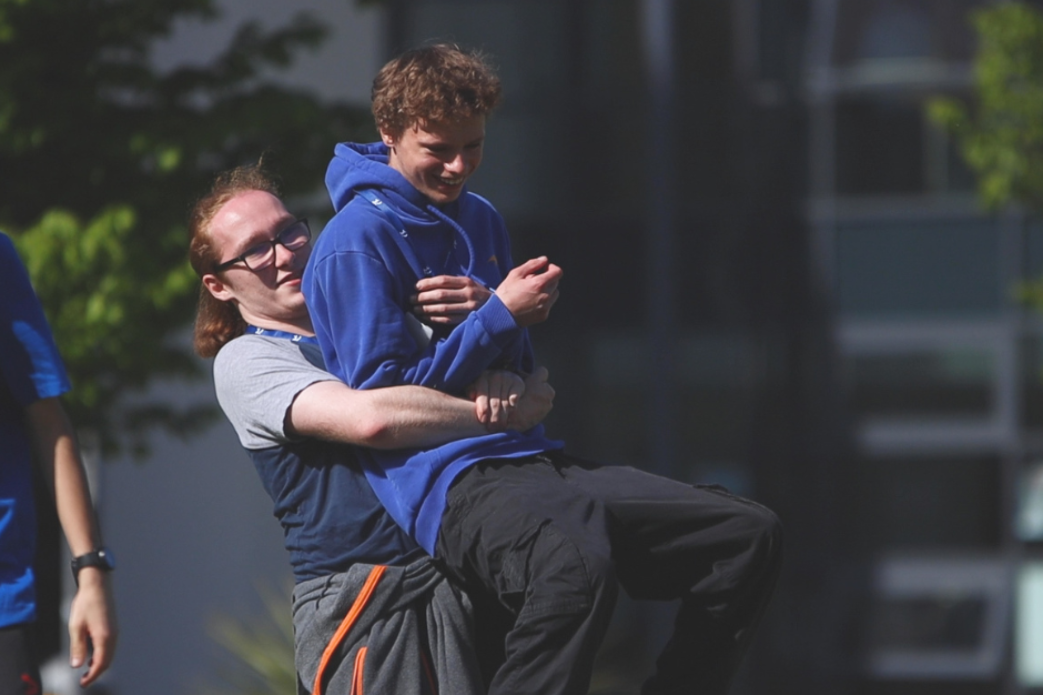 Two Pathway students are smiling for a photo.