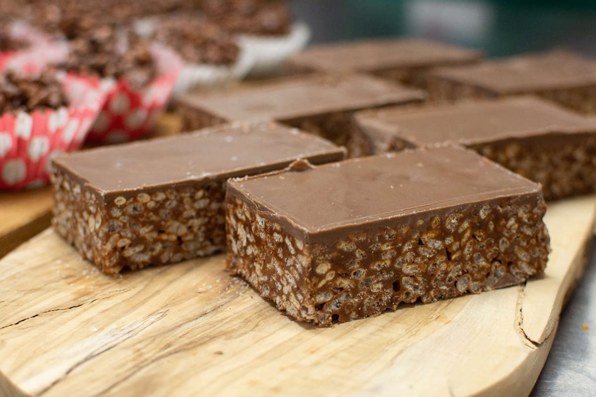The image shows a close up shot of chocolate rice krispie cake