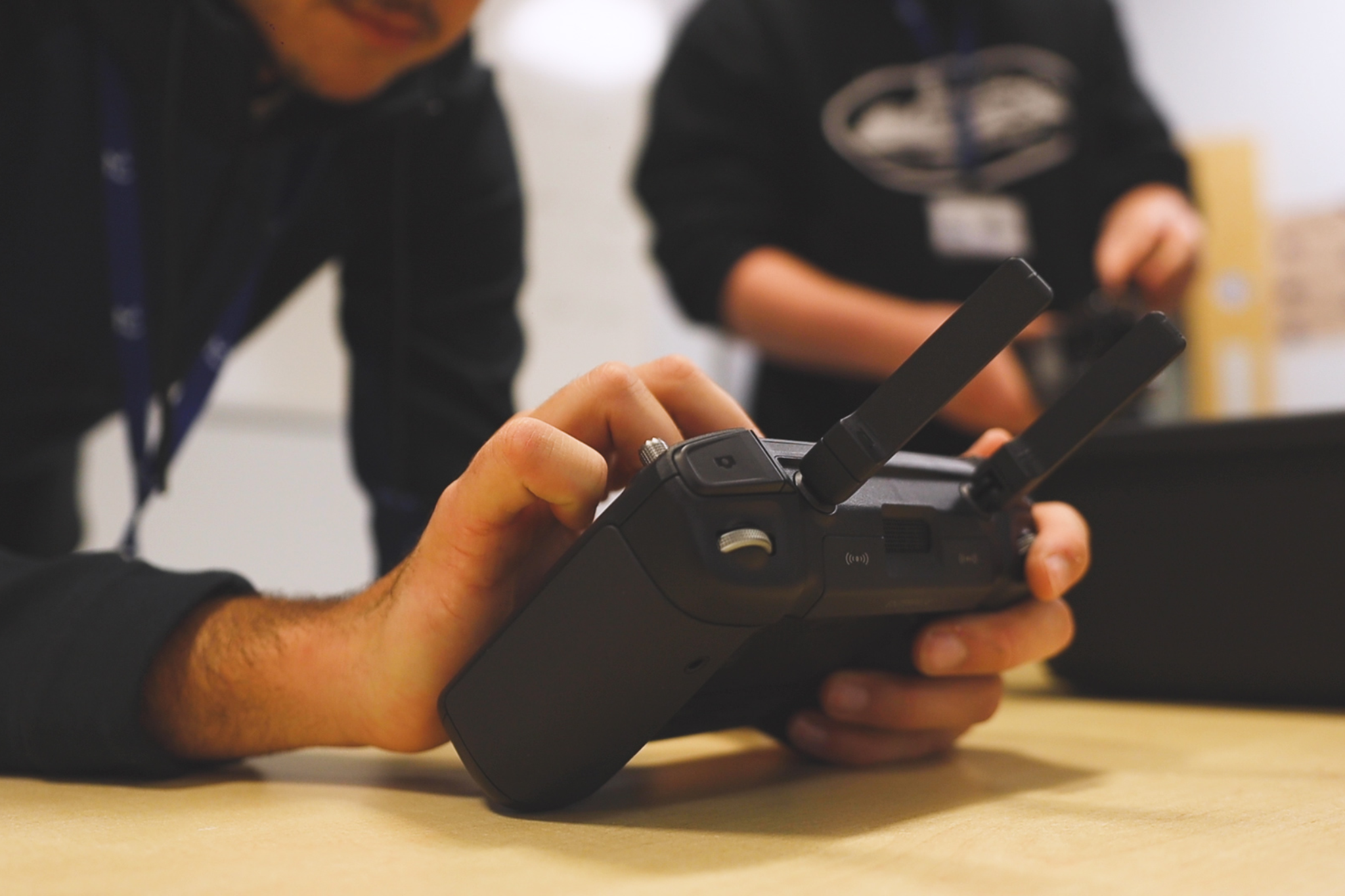 A student is using a construction controller.