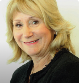 A headshot of woman smiling