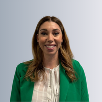 a headshot of a female staff member smiling