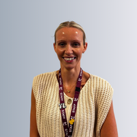 a headshot photo of a female student smiling