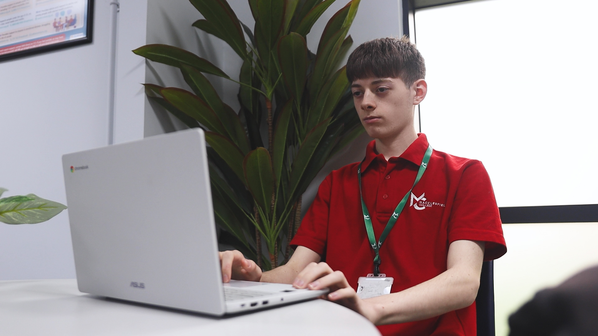 a student is working on a laptop