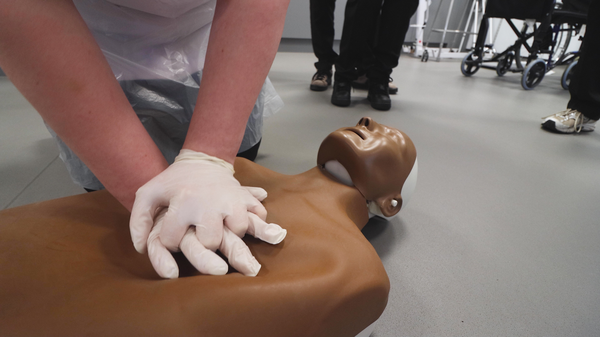 A health student practices CPR techniques