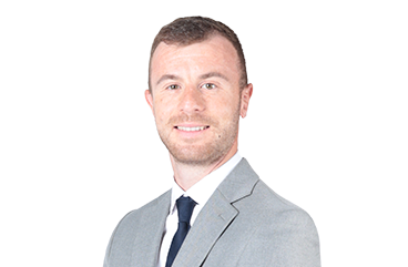 A headshot of a male staff member against a white background