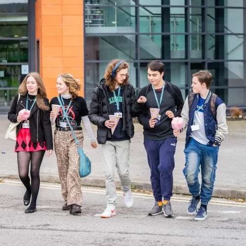 A group of students walking in front of Macclesfield College
